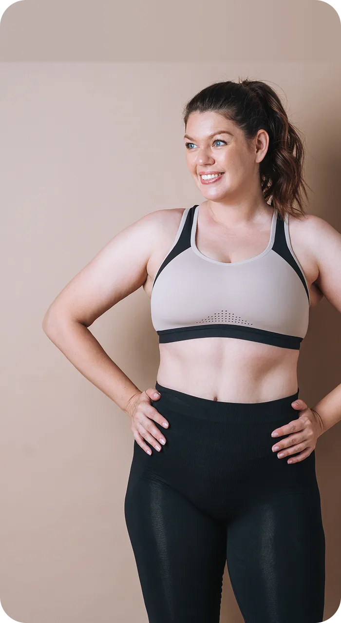 Smiling member in workout clothes